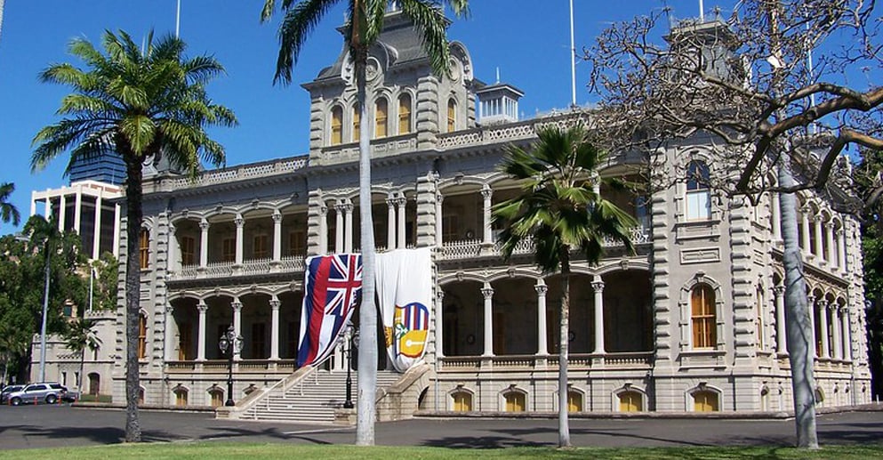 building with flags in front