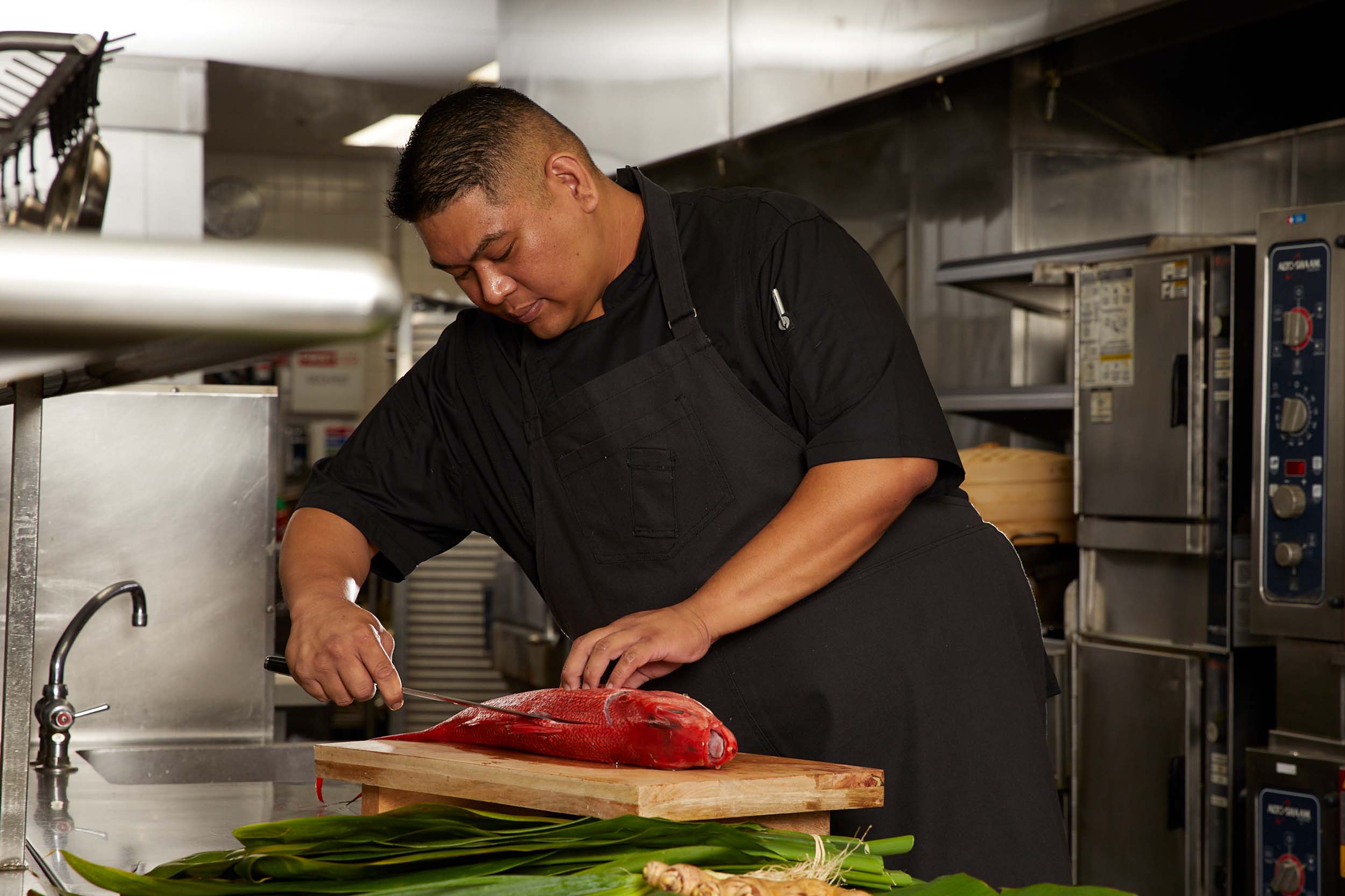 chef fileting fish