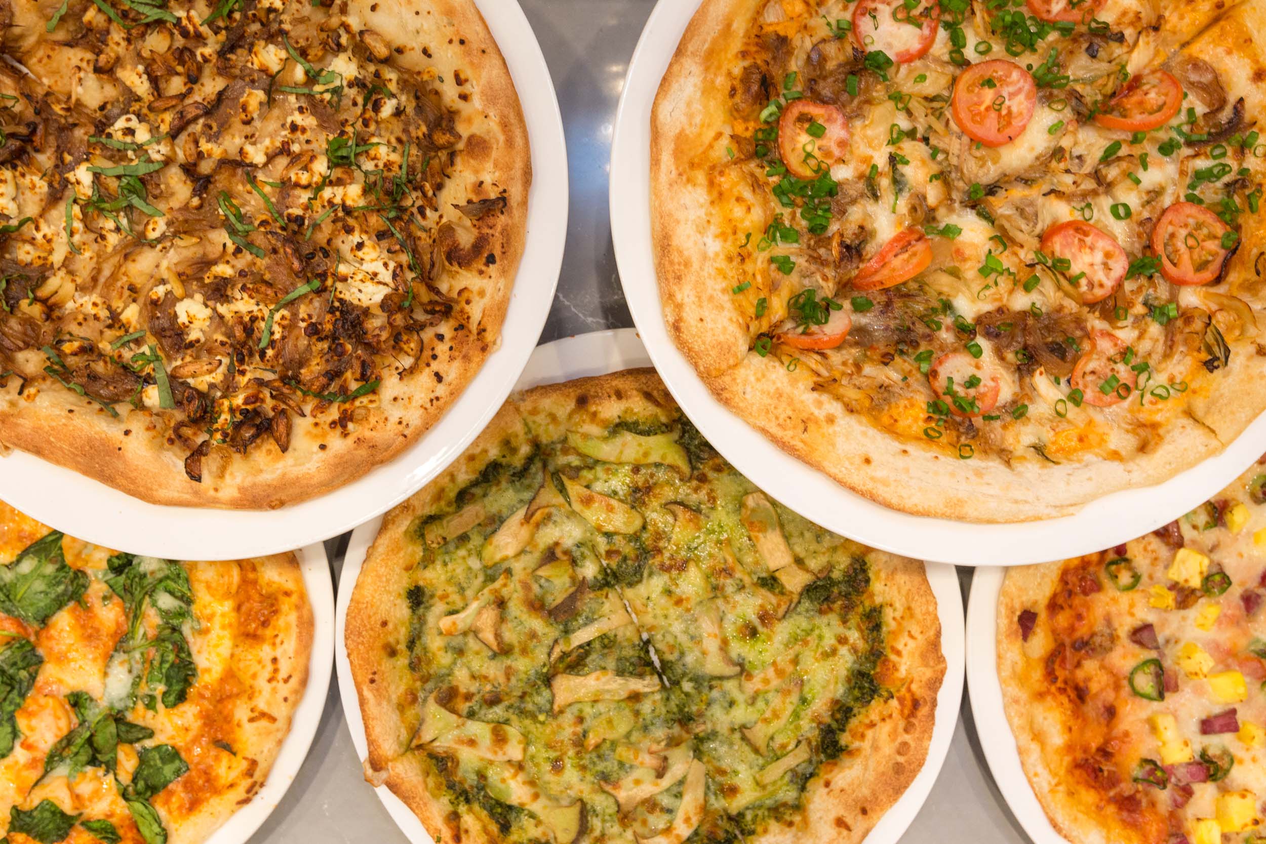 aerial of pizzas
