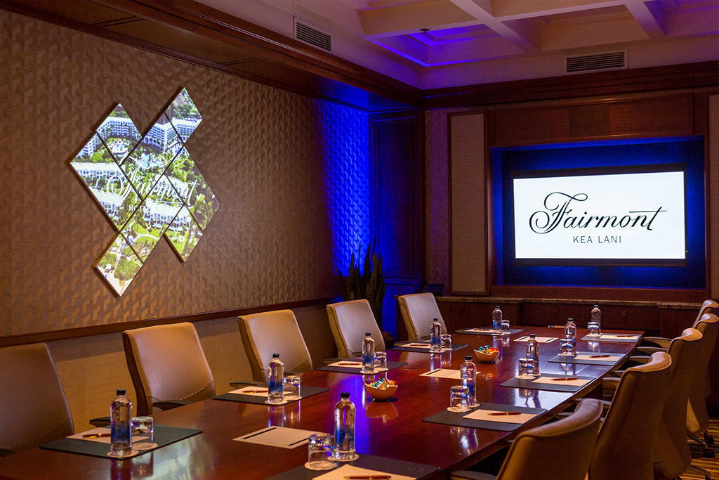 meeting room set with water bottles and notepads