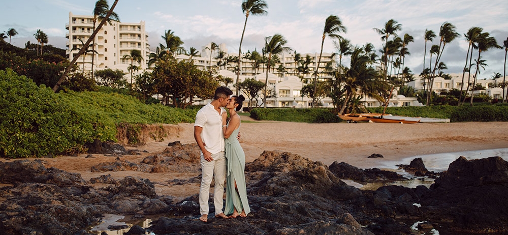 couple kissing on the beach