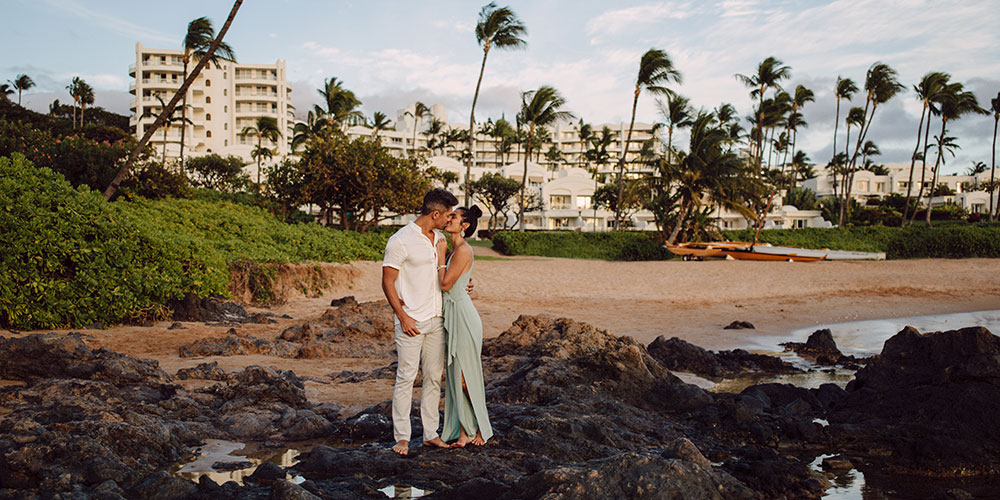 couple kissing on the beach