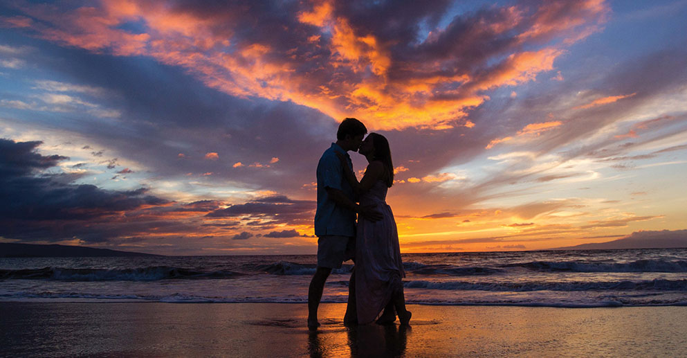 couple kissing on the beach