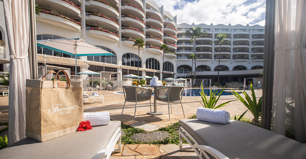 patio chairs along the poolside