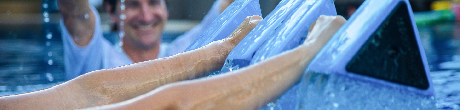 people using weights in the water