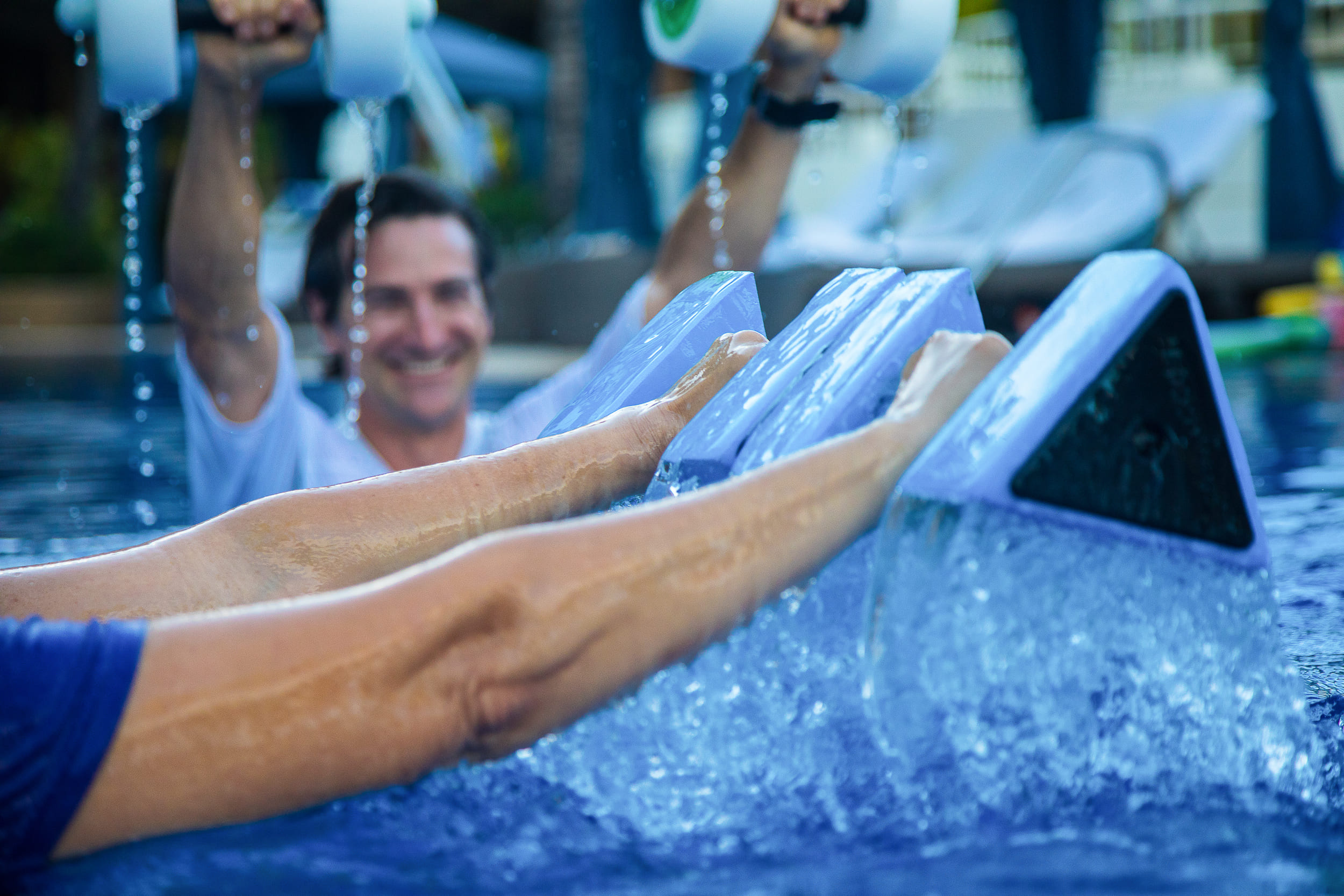 people using weights in the water